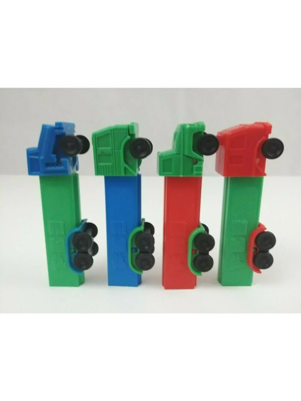 Vintage Lot of 4 Semi Truck Pez Dispensers Different Colors & Trucks (B)